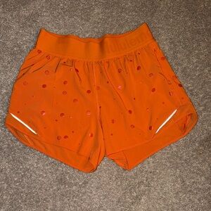 RARE lululemon athletica Vibrant Orange Hottie Hot Shorts, size 6